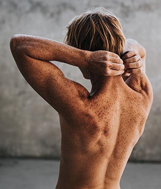 Mole check on freckled back | Meyer Clinic